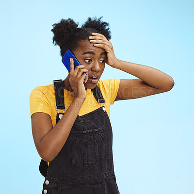 Buy stock photo Shocked, surprised and black woman on a phone call for news isolated on a blue background in studio. Wow, crazy and African girl talking about gossip and bad communication on a mobile on a backdrop