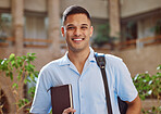 Face portrait, man and university student in campus ready for learning. Education, college and happy male learner from Brazil holding book for knowledge, studying and literature research outdoors.