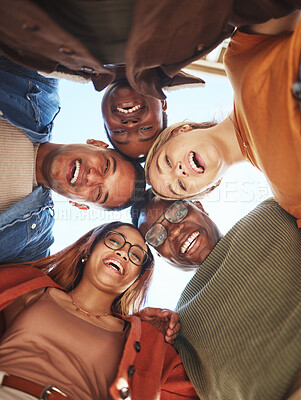 Buy stock photo Group huddle, portrait smile and hug below for community, teamwork or trust together in the outdoors. Happy people smiling in diversity for solidarity or unity for team support or friendship