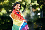 Portrait, woman and rainbow flag for pride, support and lgbtq awareness, sexuality freedom and queer. Female, girl and they with equality, love and gender neutral lifestyle for activism and festival