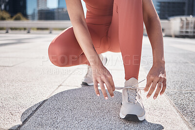 Buy stock photo Hands, fitness and black woman tie shoes getting ready for training in city. Workout, sports athlete and female runner tying sneaker lace and preparing for jog, running or exercise outdoors on street