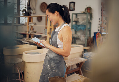 Buy stock photo Tablet, pottery and woman typing for small business, online store and website for clay, sculpture and art. Creative workshop, digital tech and girl do inventory, ecommerce and sell ceramic products