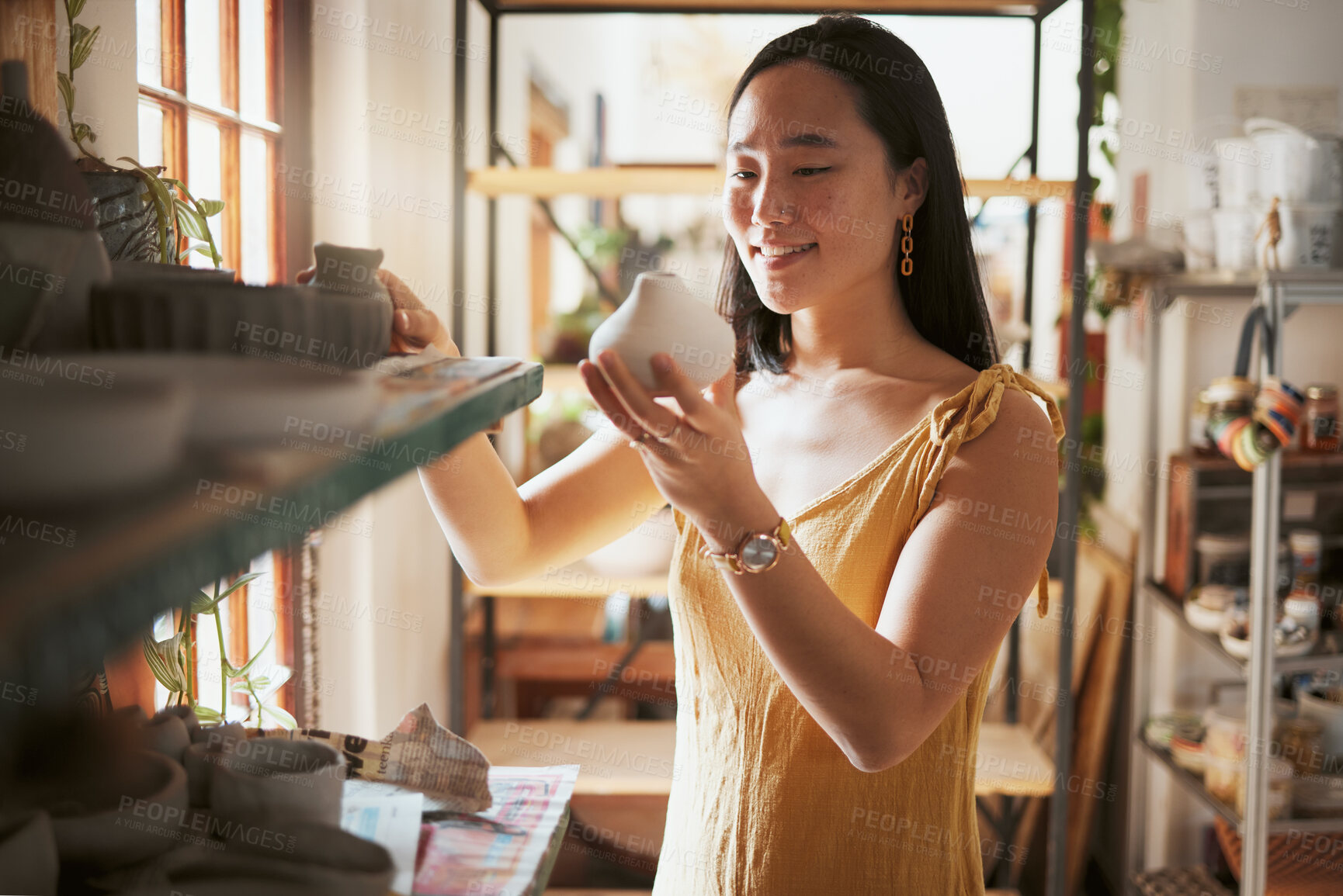 Buy stock photo Art, store and creative business woman with pottery, product and startup vision in her studio, happy and smile. Ceramic, sculpture and asian woman excited about dream job and small business in Japan