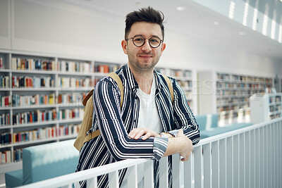 Buy stock photo College, portrait and man student in a bookstore for studying, learning or knowledge with books. Education, library and young male with a college scholarship standing in the academic study area.