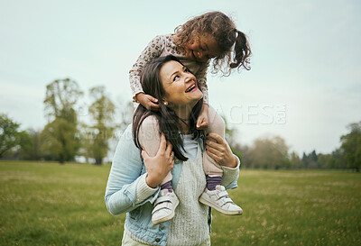 Buy stock photo Park, mother and girl sitting shoulders for happiness, bonding or care on nature walk together in spring. Woman, kid and happy for quality time, love or play on grass field for outdoor fun in Toronto