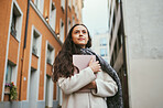 Woman, tablet and idea in a city of a freelance travel writer thinking of buildings architecture. Writing idea, tech and worker by a urban building with a happy smile about holiday traveling for work