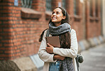 Travel, city and student walking with tablet on outdoor adventure in sidewalk street, road or journey In Chicago USA. Urban architecture buildings, beauty and happy woman smile on winter vacation