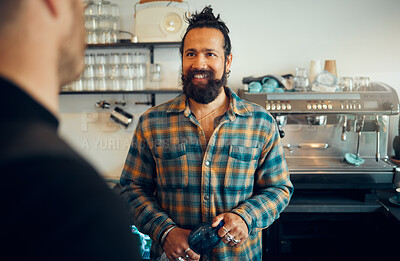 Buy stock photo Man, barista helping customer and service in coffee shop, conversation and friendly entrepreneur. Guy, male employee or assist client in cafe, talking or order tea with successful business or startup