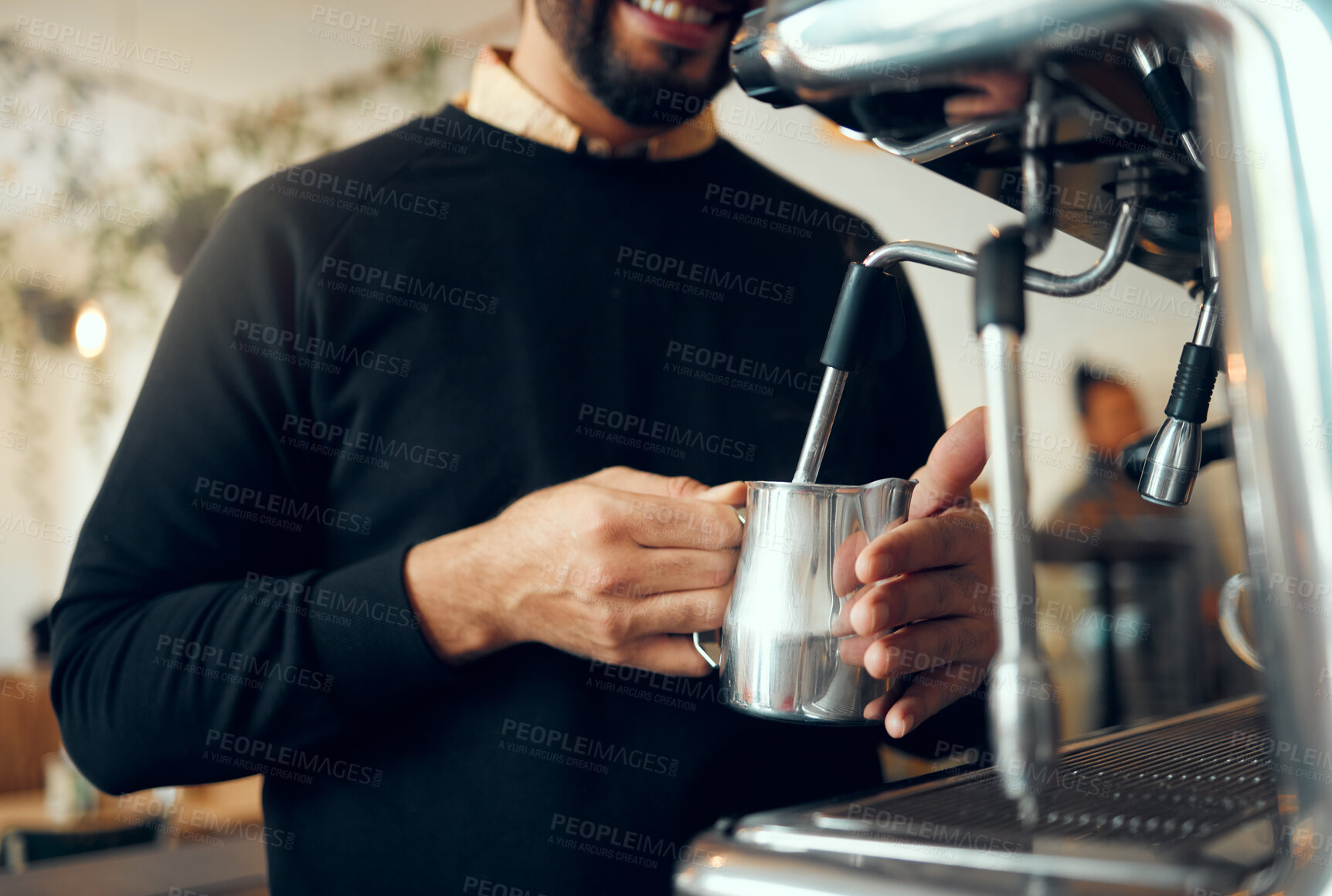 Buy stock photo Hands, barista and brewing coffee in kitchen using machine for hot beverage, caffeine or steam. Hand of employee male steaming milk in metal jug for premium grade drink or self service at cafe