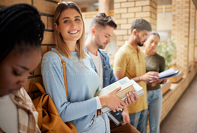 Buy stock photo University, lobby and portrait of woman and students standing in row together with books at business school. Friends, education and future, girl from USA in study group on campus in corridor for exam