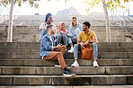 Relax, friends or students on stairs at break talking or speaking of future goals or education on campus. Diversity, school or happy young people in university or college bonding in fun conversation