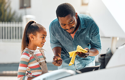 Buy stock photo Oil change, father and child learning about car for mechanic repair of family vehicle outdoor. Black man teaching daughter while bonding and working on engine for transport, safety and insurance