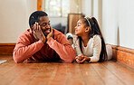 Father, love and daughter relax on the floor, happy and bonding while talking in their home together. Black family, girl and parent enjoy conversation while lying, content and sweet on the weekend