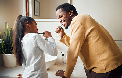 Buy stock photo Oral care, brushing teeth and father with daughter in bathroom for hygiene, grooming and bonding. Dental health, girl and black people cleaning while having fun, playful and smile in their home