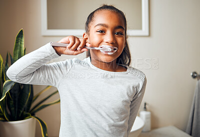 Buy stock photo Girl brushing teeth, portrait and toothbrush for hygiene with clean mouth and fresh breath with dental health. Kid, cleaning with toothpaste in bathroom and wellness at family home with healthy gums