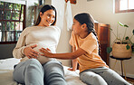 Happy, pregnant and mother with kid on bed for belly touch with excited, curious and joyful smile. Indian family and child waiting for baby sibling and bonding together with mom in home bedroom.
