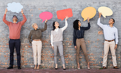 Buy stock photo Speech bubble, communication and feedback with business people and mockup for social media, vote and review. Design, contact and chat sign with employee and board at brick wall for voice and opinion 