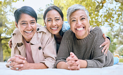 Buy stock photo Portrait, family and sisters in a park with group of people, happy and laughing looking relax. Friends, senior ladies and women enjoying a picnic with together in spring, cheerful and excited outdoor