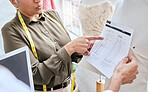 Fashion design sketch, team and women point at paper illustration, clothes service or creative studio dress. Startup small business, workshop collaboration and senior partnership teamwork on outfit