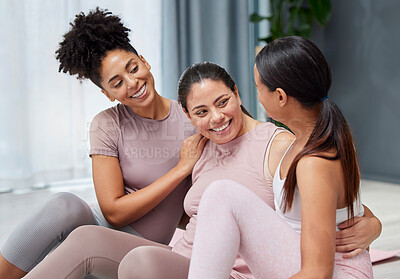 Buy stock photo Friends, hug and yoga on a floor, bonding and relax, exercise and meditation, happy and smile while embracing. Women, group and embrace in living room, positive and caring while talking after pilates