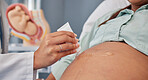 Hand, stomach or pregnant with a doctor in hospital to apply gel to the skin of a woman during an appointment or checkup. Mother, health and pregnancy with the belly of a female parent in a clinic