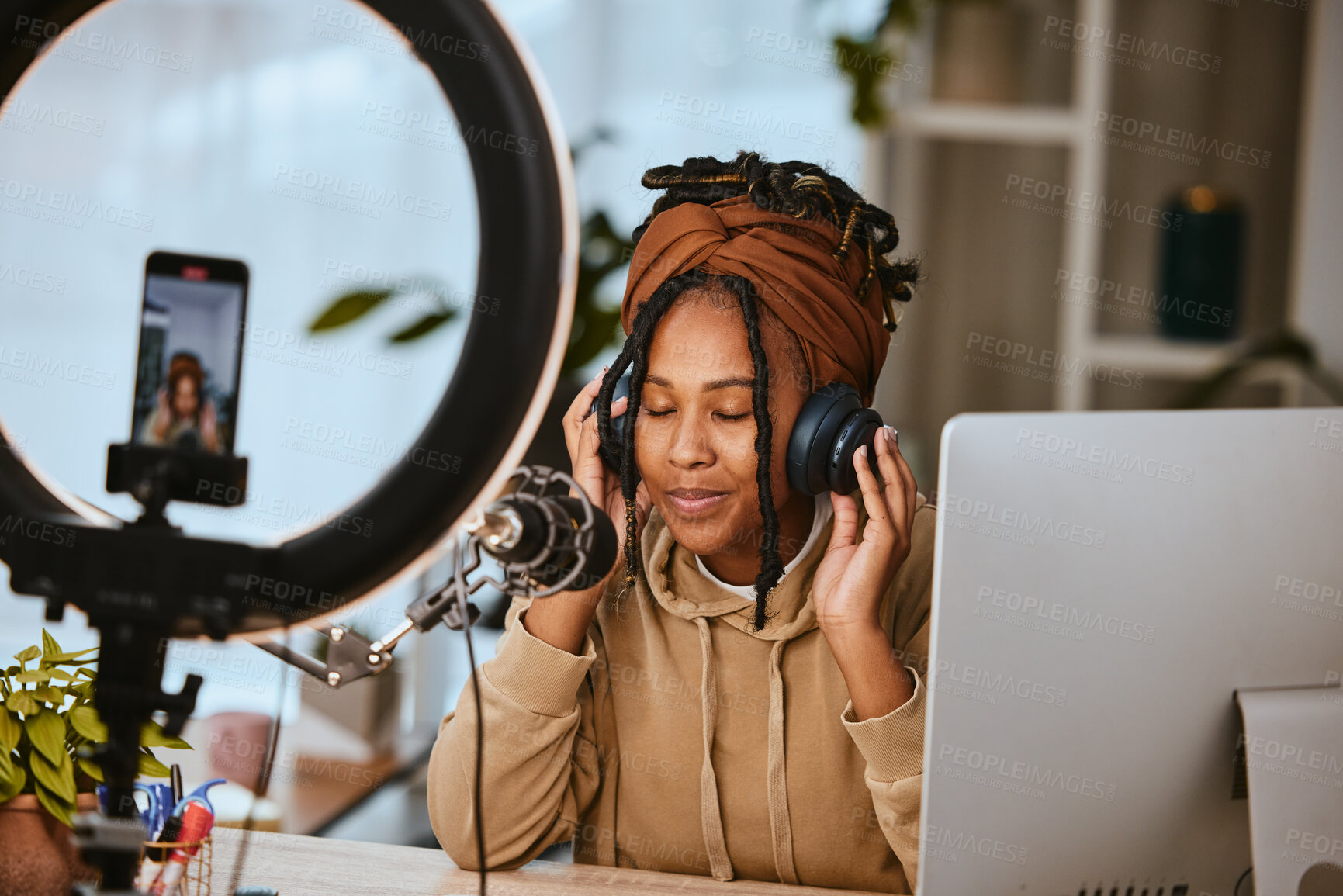 Buy stock photo Communication, phone and influencer streaming podcast, radio talk show or speaker talking about teen culture. Presenter, black woman or host speaking about student news on online broadcast microphone