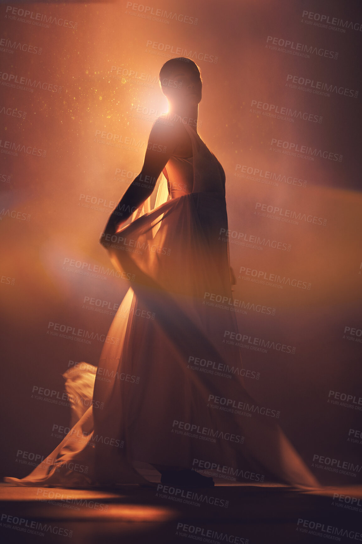 Buy stock photo Orange lighting, fantasy and silhouette of woman with stylish dress for creative fashion, art deco and beauty. Dance, aesthetic and shadow of girl pose for dream, magic and freedom in glowing studio