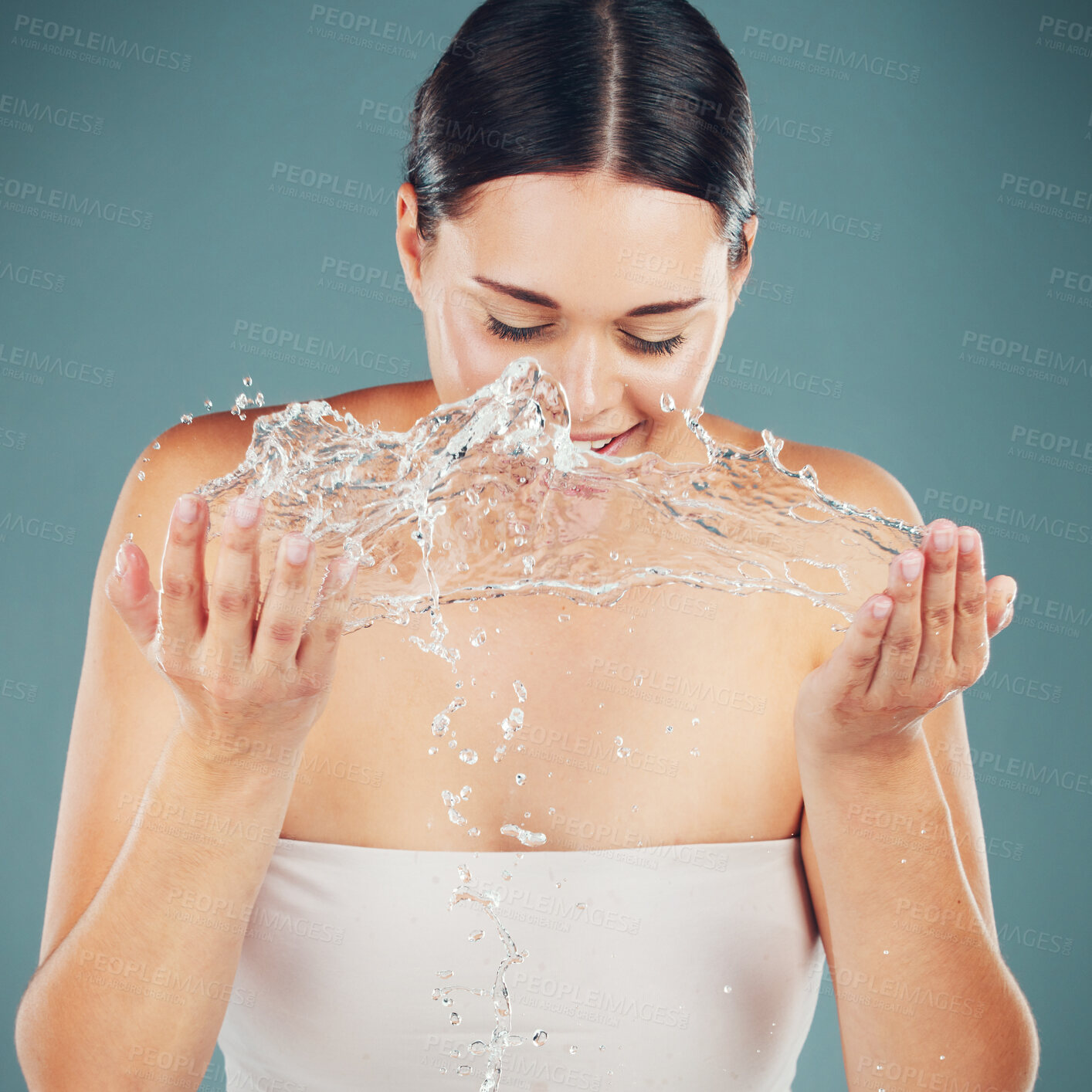 Buy stock photo Skincare, water splash and beauty of woman washing face for dermatology wellness and health. A happy aesthetic model person cleaning skin or body for facial spa treatment for clean and healthy glow