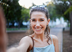 Selfie, young woman and casual in park, walking and smile for fun, balance and happiness. Portrait, female and lady with joy, summer and chilling outdoor, cheerful and freedom on break and weekend