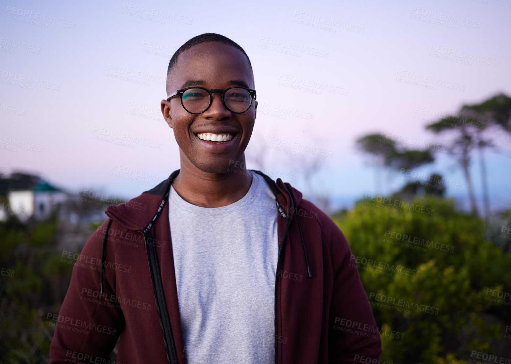 Buy stock photo Happy, smiling and portrait of a black man in nature for fun, relaxation and walking in Turkey. Smile, peace and calm African person in a park for an environment walk, adventure and zen during sunset