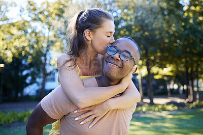 Buy stock photo Interracial, piggy back and couple in park, happiness and bonding for romance, loving and smile. Romantic, black man and woman on back, nature and love for relationship, dating and playful together