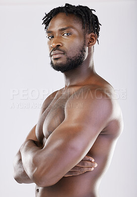 Buy stock photo Confident, muscular and portrait of a black man with arms crossed isolated on a grey studio background. Fitness, health and African athlete with muscle, power and bodybuilding body on a backdrop