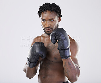 Buy stock photo Fitness, boxer portrait and black man with gloves to fight for sports training and workout in studio. Strong athlete person for exercise, boxing performance and mma competition with power and energy