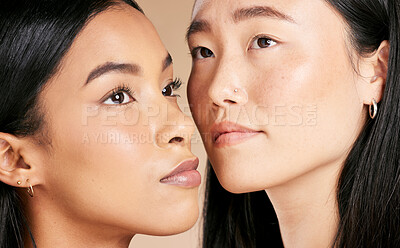 Buy stock photo Face, beauty and diversity with model woman friends closeup in studio on a beige background. Skincare, facial or cosmetics with an attractive young female and friend posing to promote a skin product
