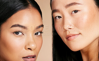 Buy stock photo Diversity women, beauty and skincare portrait in studio for dermatology, makeup and cosmetics. Asian and black person together for foundation skin glow, spa facial and eyes of friends for wellness