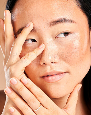 Buy stock photo Asian woman, face and hands thinking for beauty wellness, skincare dermatology cosmetics skin glow in studio. Model, facial treatment and relax natural self care vision or cosmetology healthcare
