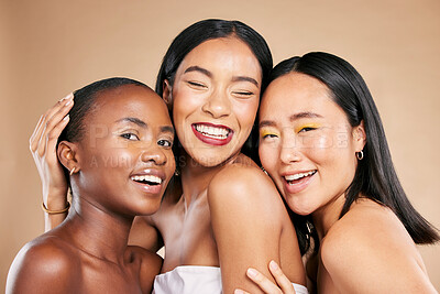 Buy stock photo Happy women, portrait smile and hug in beauty for skincare, cosmetics or makeup against a studio background. People, friends or models smiling in happiness or satisfaction for fun healthy treatment
