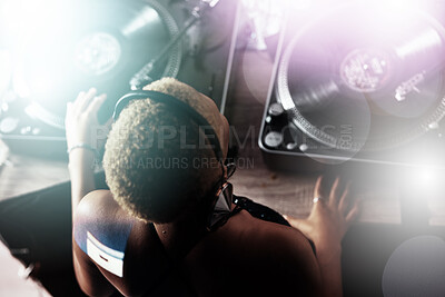 Buy stock photo Black woman, DJ and music for party, club or event in celebration, sound or energy with technology. African American female musician with turntable for disco, concert or audio track at nightclub
