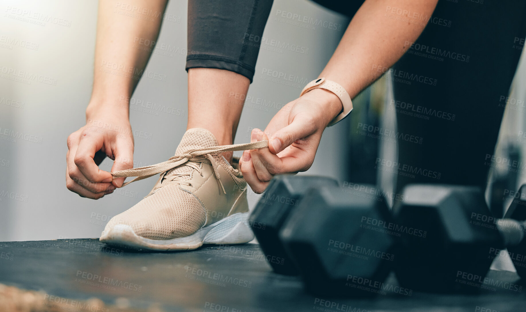 Buy stock photo Fitness, hands or woman tie shoes lace before start of dumbbell exercise, gym training or sports workout. Health, wellness and legs of girl, athlete or person prepare for cardio performance challenge