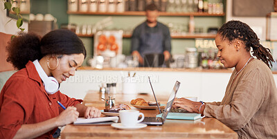 Buy stock photo Students writing, studying on laptop in cafe for elearning, university education or working remote. Black women, friends and college research in coffee shop together for collaboration or teamwork