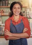 Portrait, cafe barista and woman with arms crossed ready to take your order. Coffee shop, waiter and confident, happy and proud young female waitress from Brazil or small business owner of cafeteria.