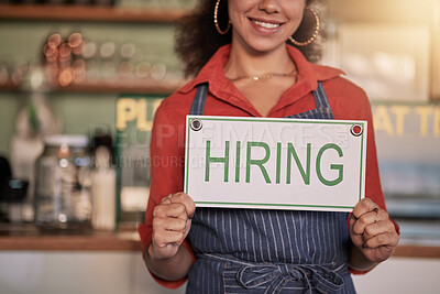 Buy stock photo Small business, hands or black woman with a hiring sign for job vacancy offer in cafe or coffee shop. Recruitment, marketing or happy entrepreneur smiles with an onborading message in store
