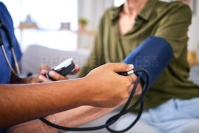 Buy stock photo Blood pressure, hospital and hypertension health test of doctor hand consulting a woman. Nurse, consultant and health care worker for life insurance checking cardiovascular results with monitor