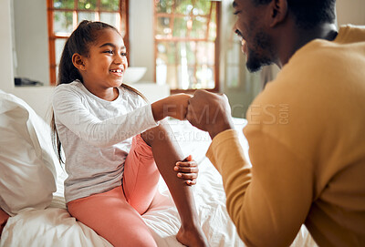 Buy stock photo Black family, father and girl fist bump for love, bonding or care in bedroom. Hands gesture, unity and happy kid and man with fists sign for support, union or trust, solidarity and affection in house