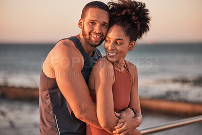 Buy stock photo black couple, hug and relax beach fitness together for cardio workout, exercise training and freedom outdoor. Black man, woman smile and happy hugging by ocean sea for bonding or runner wellness rest