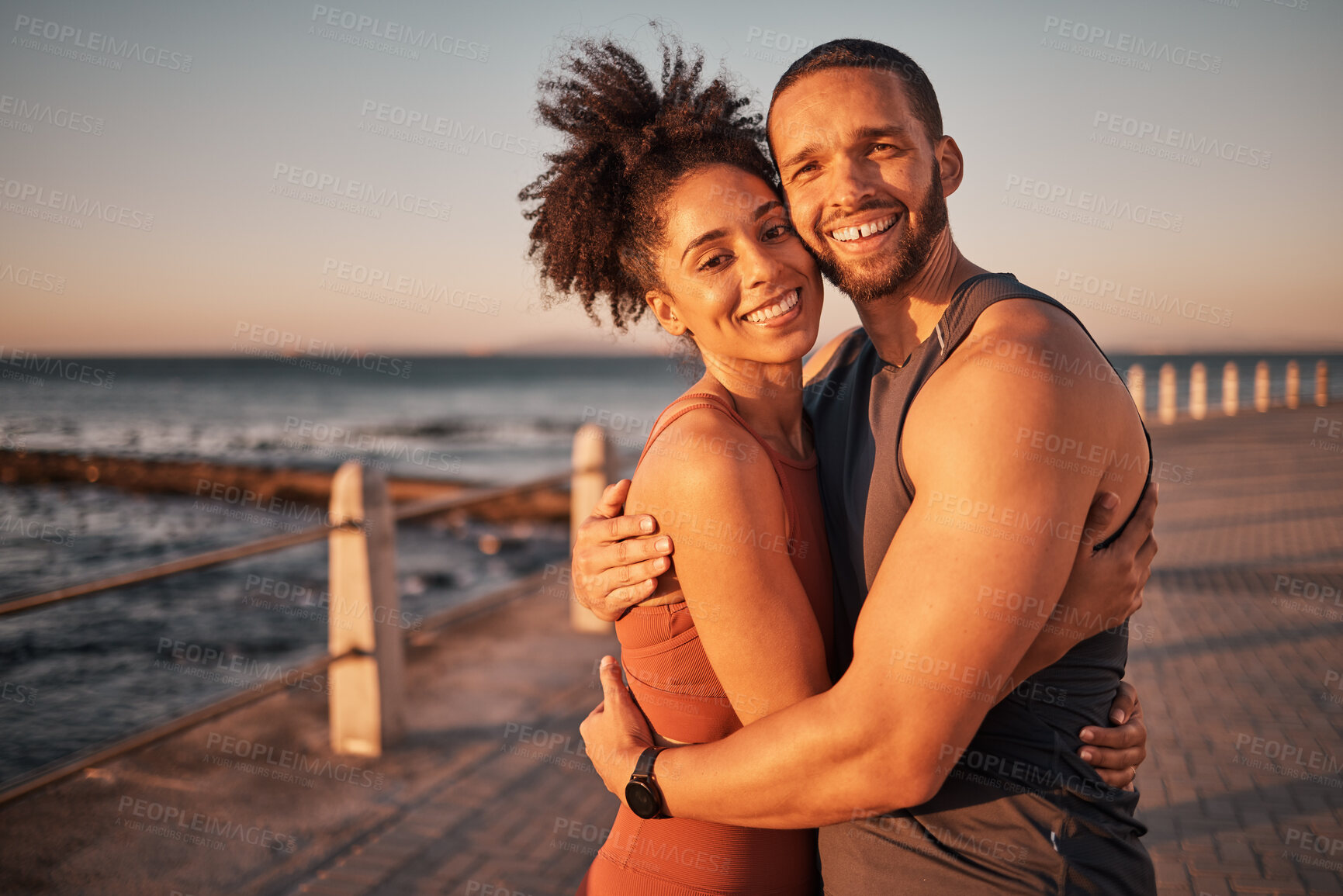 Buy stock photo Fitness, love and portrait with couple and hug at beach for workout, exercise and health partner. Wellness, sunset and smile with man and woman training for, running, marathon and cardio endurance