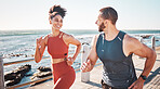Running, fitness and water with a sports couple outdoor during summer for cardio or endurance exercise. Health, training and ocean with a man and woman runner on a promenade for a workout together