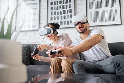 Buy stock photo Virtual reality, gaming and metaverse with a couple playing video games in their home together for fun or enjoyment. VR, game and 3d ai with a man and woman gamer bonding in a house living room