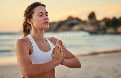 Buy stock photo Meditation, yoga prayer hands and woman at beach outdoors for health or wellness. Sunset, zen pilates and female yogi with namaste hand pose for praying, training or mindfulness exercise at seashore