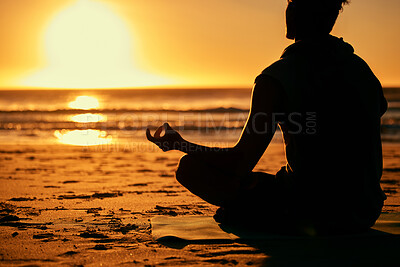 Buy stock photo Meditation, lotus and silhouette of man at beach outdoors for health and wellness. Sunset, zen yoga and shadow or outline of male yogi meditating, chakra training and mindfulness exercise at seashore